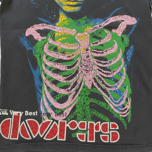Black t-shirt with colorful skeleton design and 'The Doors' text on a white background